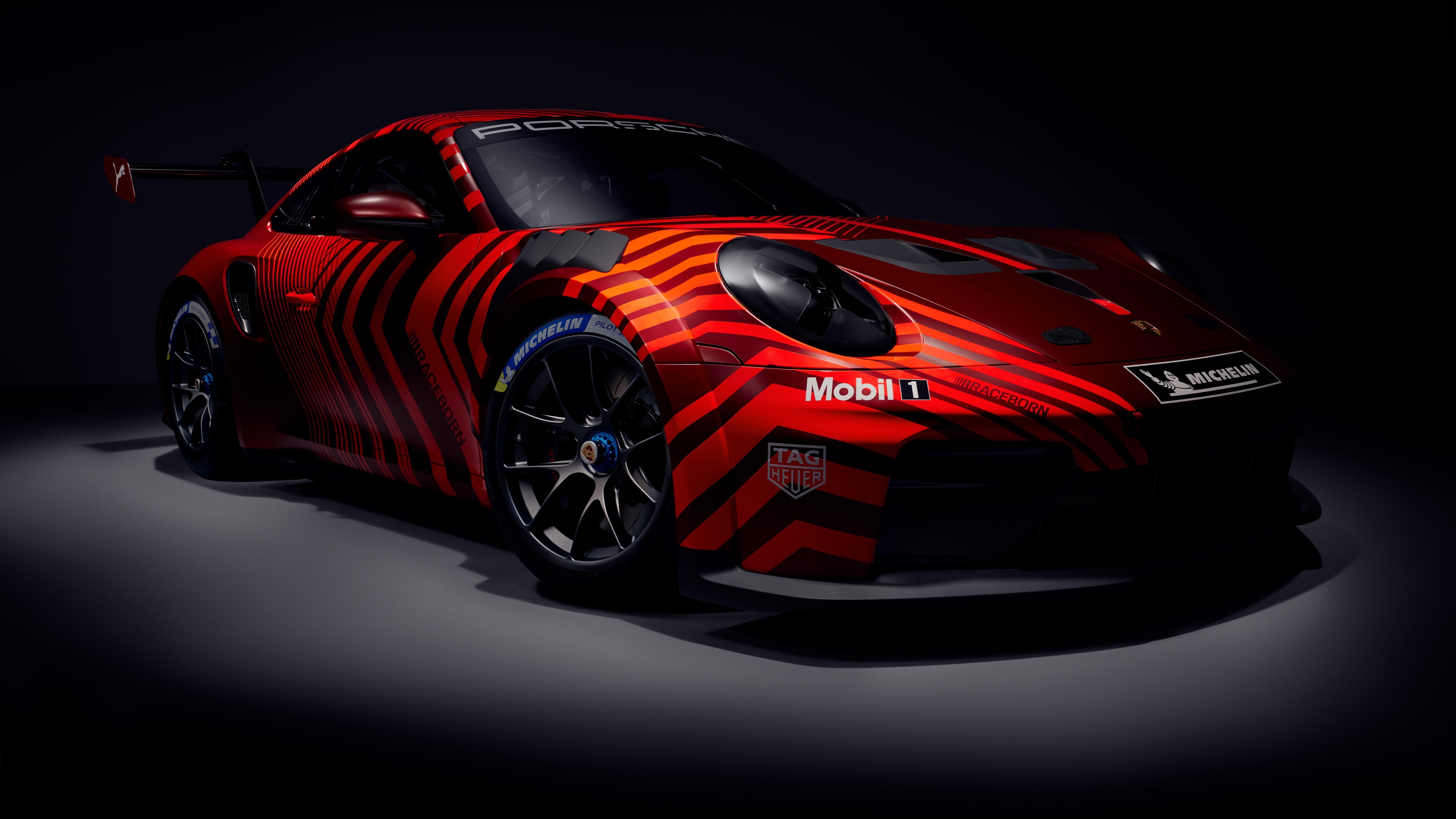 Porsche 911 GT3, factory reveal camouflage livery, side profile