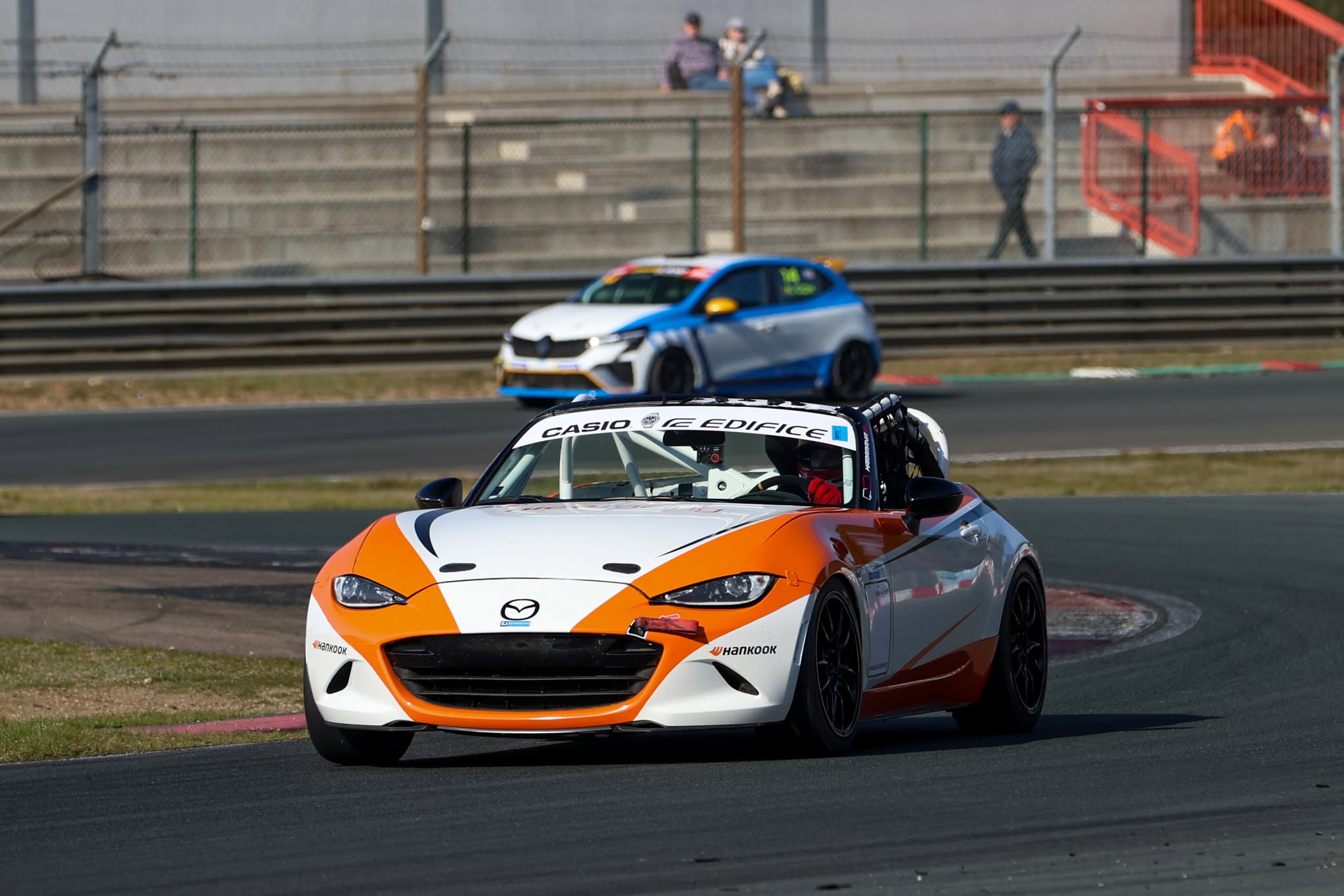 NiceRacing Mazda MX-5 Cup car with an EJ Automotive Renault Clio Cup car behind